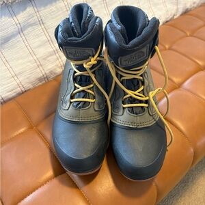 The North Face Black and Yellow Winter Boots